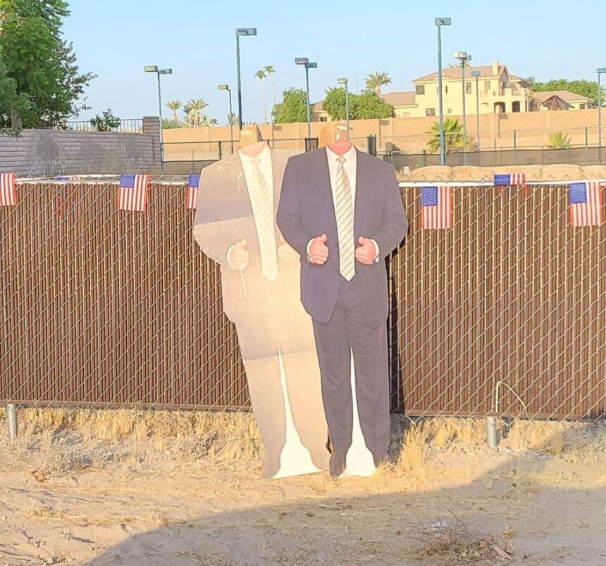 vandalized President Trump cut out