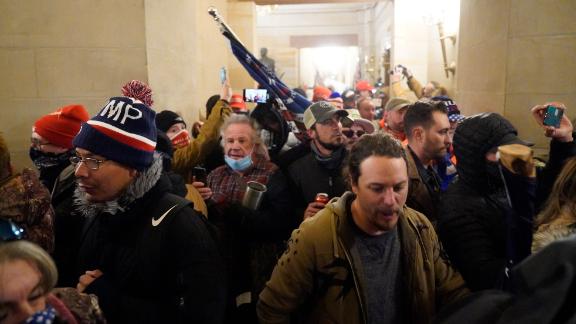 210107111828-01-rioters-inside-capitol-hallway-0106-live-video