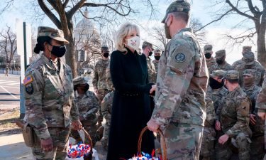 First lady Jill Biden greets members of the National Guard with chocolate chip cookies outside the Capitol on January 22
