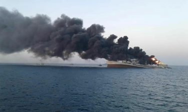 Smoke rises from the Iranian navy ship Khark in the Gulf of Oman.
