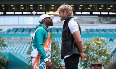 Floyd Mayweather and Logan Paul face off during media availability prior to their June 6 match in Miami Gardens