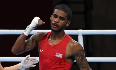 U.S. boxer Delante Johnson celebrates his victory over Argentina's Brian Agustin Arregui at the 2020 Tokyo Olympic Games