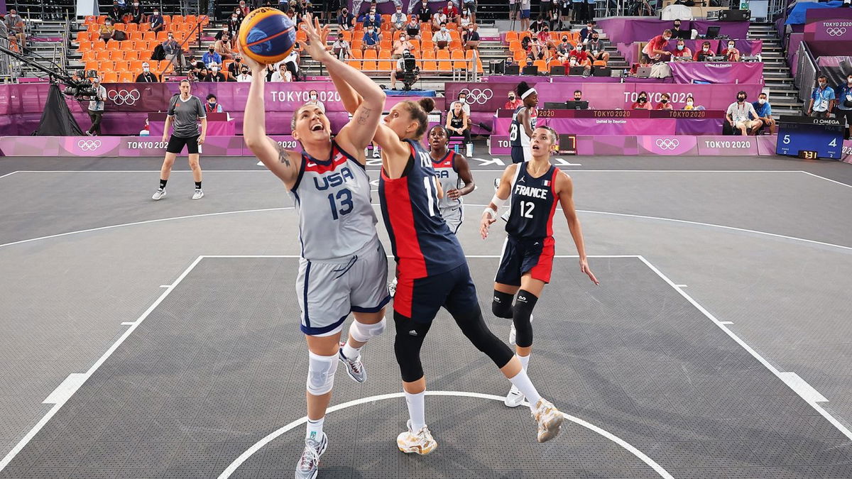 Stephanie Dolson draws a foul for the United States against France