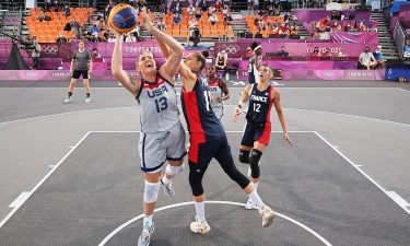 Stephanie Dolson draws a foul for the United States against France