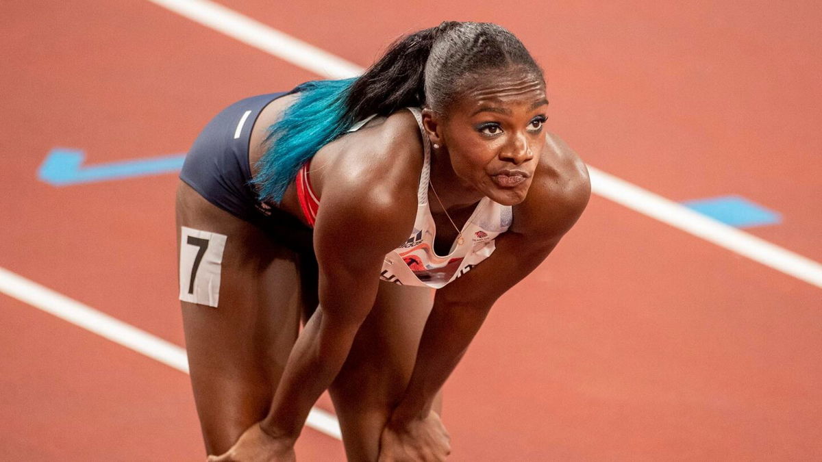 Dina Asher-Smith of Great Britain reacts to missing out on a place in the final after the 100m semi finals for women during the Athletics competition at the Olympic Stadium at the Tokyo 2020 Summer Olympic Games