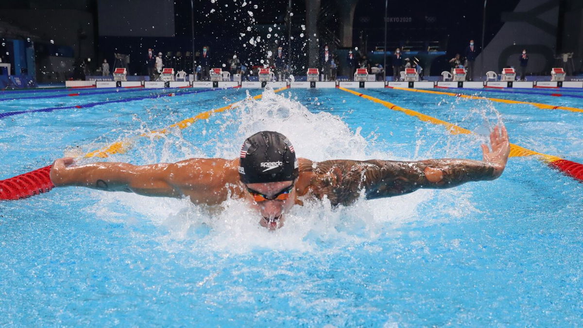 Caeleb Dressel races the final of the men's 100m butterfly on Day 8 at the Tokyo Olympics.