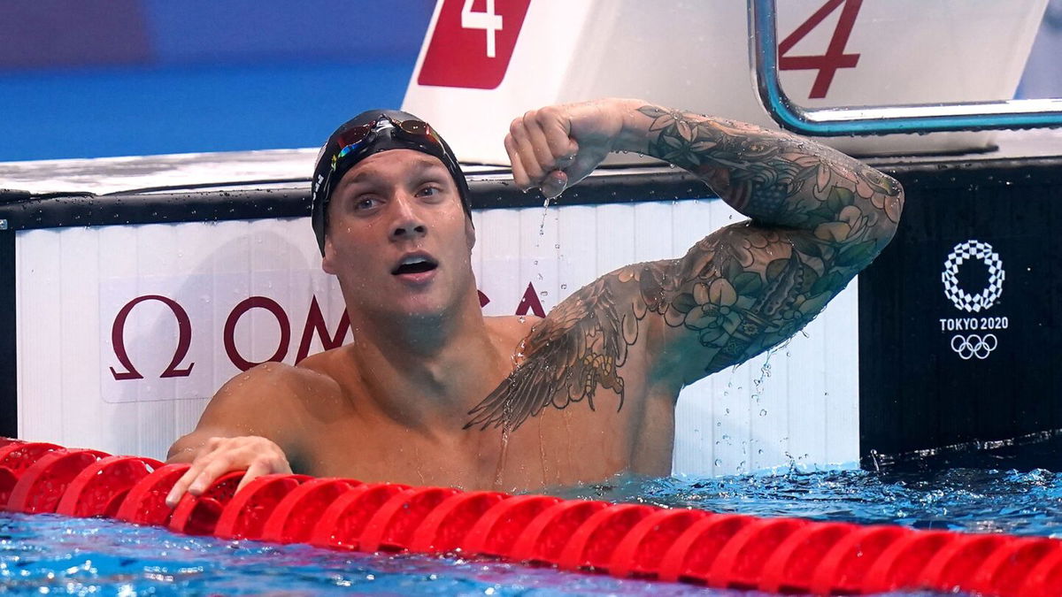 Caeleb Dressel flexes his Florida-themed left arm tattoo