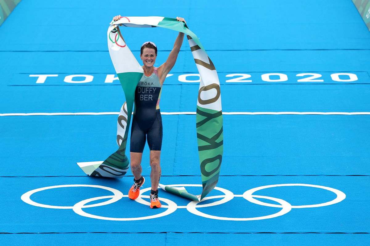 Flora Duffy of Team Bermuda celebrates winning the gold medal during the Women's Individual Triathlon