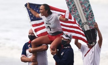Carissa Moore competes in Tokyo