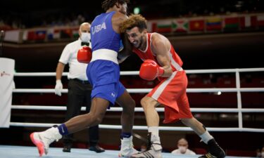 U.S. boxer Keyshawn Davis advances through Round of 16 via TKO of France's Sofiane Oumiha.