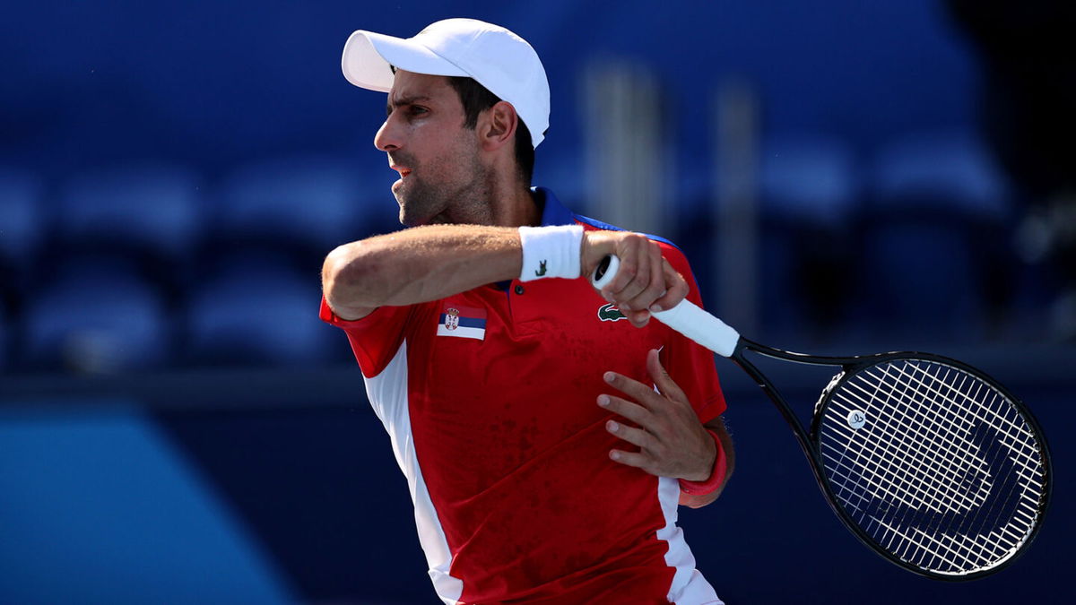 Novak Djokovic competes in Tokyo