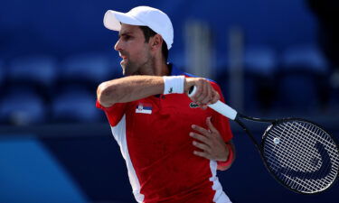 Novak Djokovic competes in Tokyo