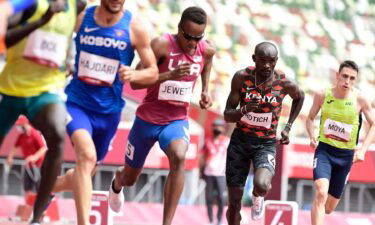 Kenya's Ferguson Cheruiyot Rotich (2nd R) competes to win the men's 800m heats during the Tokyo 2020 Olympic Games