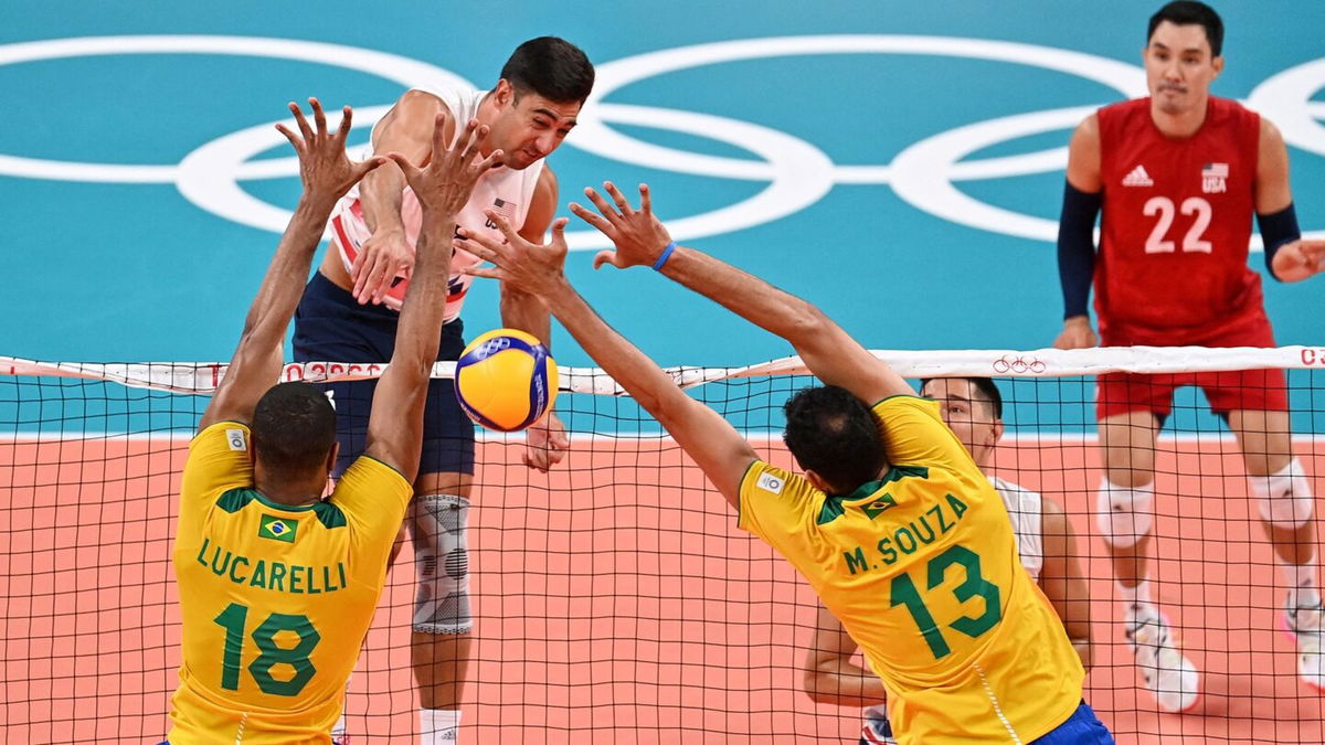 Taylor Sander spikes the ball vs. Brazil