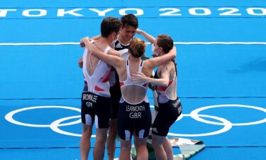 Great Britain takes first-ever mixed team gold ahead of U.S.