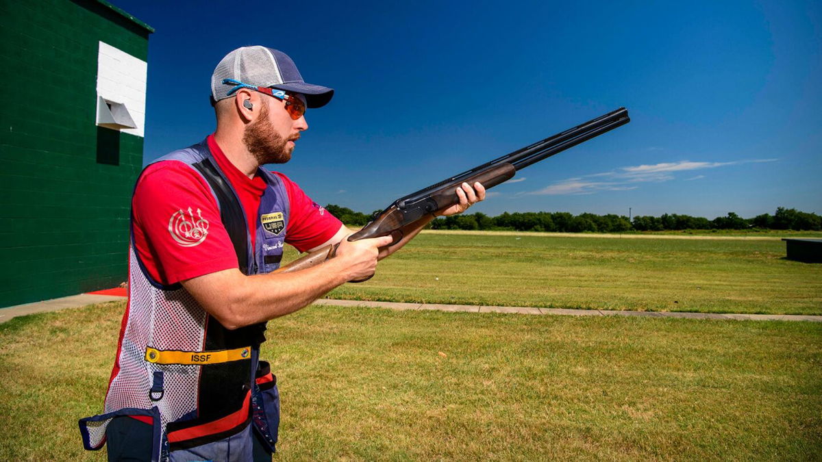 Vincent Hancock poses with a shotgun