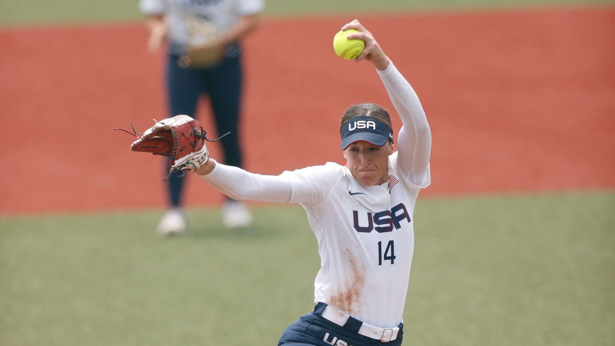 Monica Abbott pitches the ball against Canada