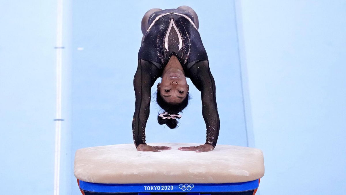 Simone Biles competes on vault