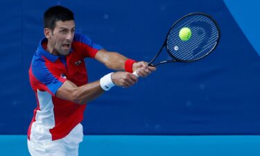 Novak Djokovic competes in Tokyo