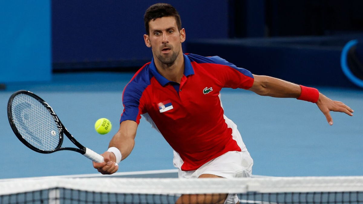 Novak Djokovic competes in Tokyo