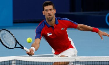 Novak Djokovic competes in Tokyo