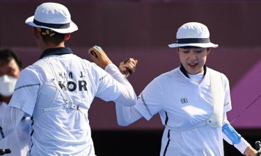 South Korea's Je-doek Kim and San An celebrate in the quarterfinals