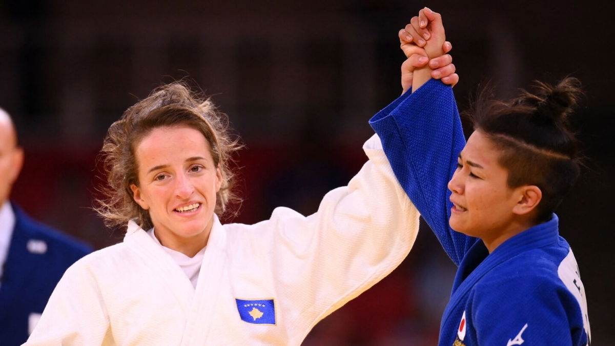 Kosovo's Distria Krasniqi celebrates winning the judo women's final versus Japan's Funa Tonaki