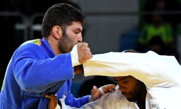 An Israeli judoka competing against a French judoka at Rio 2016