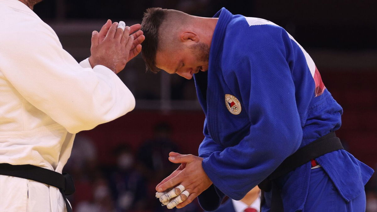 Lukas Krpalek of Czech Republic celebrates winning Olympic gold over Guram Tushishvili of Georgia