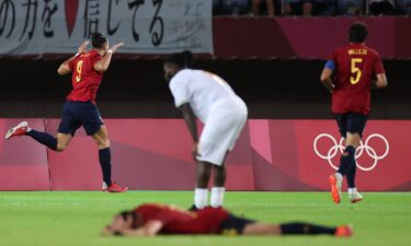 Rafa Mir of Spain celebrates after scoring late to force extra time versus Cote d'Ivoire