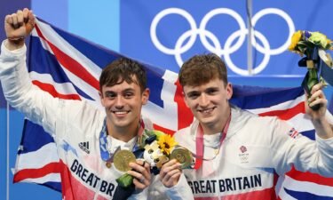 Tom Daley and Matty Lee celebrate winning gold in the men's synchro 10m platform