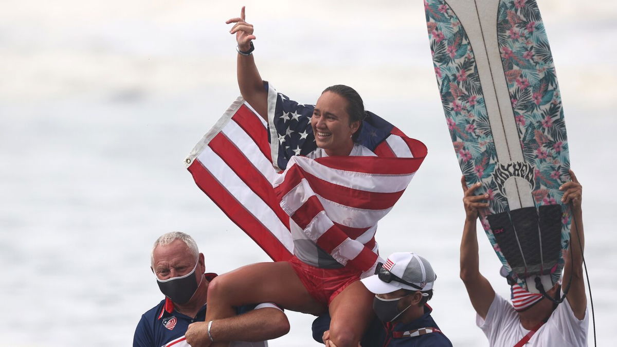 Carissa Moore of Team United States celebrates winning the Gold Medal after her final match against Bianca Buitendag of Team South Africa on day four of the Tokyo 2020 Olympic Games