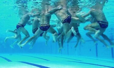 What happens below the surface of the Olympic swimming pool?