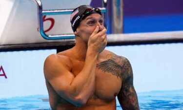 Caeleb Dressel shows his emotion after winning gold