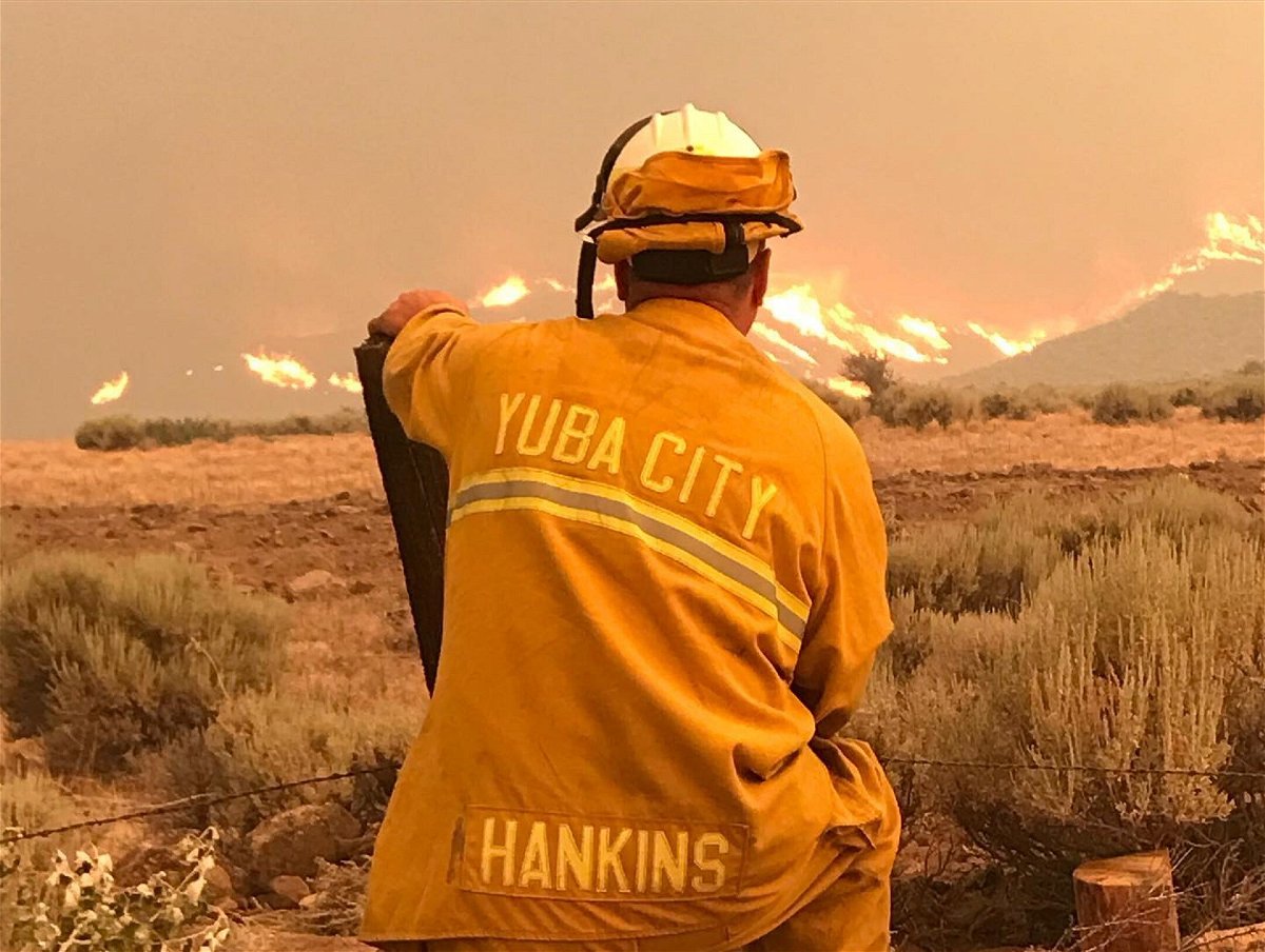 <i>Yuba City Fire Department</i><br/>Yuba City Fire Department OES 407 takes in the view while on the Beckwourth complex Fire.