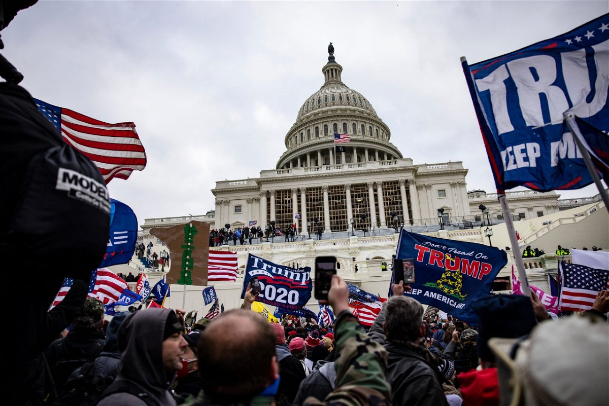 <i>Samuel Corum/Getty Images</i><br/>Pro-Trump supporters storm the U.S. Capitol following a rally with President Donald Trump on January 6. The Justice Department formally declined to assert executive privilege for potential testimony of at least some witnesses related to the January 6 Capitol attack.