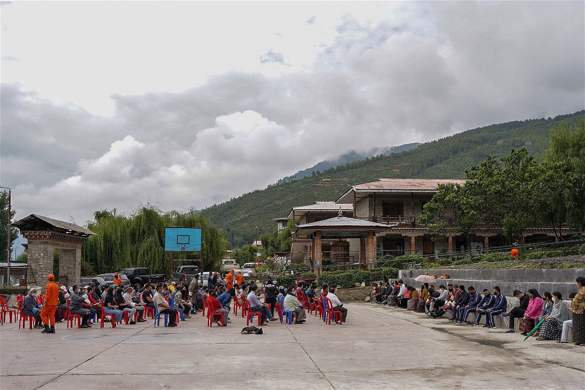 <i>Upasana Dahal/AFP/Getty Images</i><br/>People queue up to register themselves and get inoculated with the Covid-19 coronavirus vaccine at a temporary vaccination centre in Thimpu on July 20.