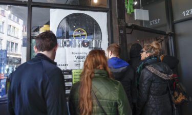 Customers wait in line to enter Chicago's Shuga Records on Record Store Day on April 13