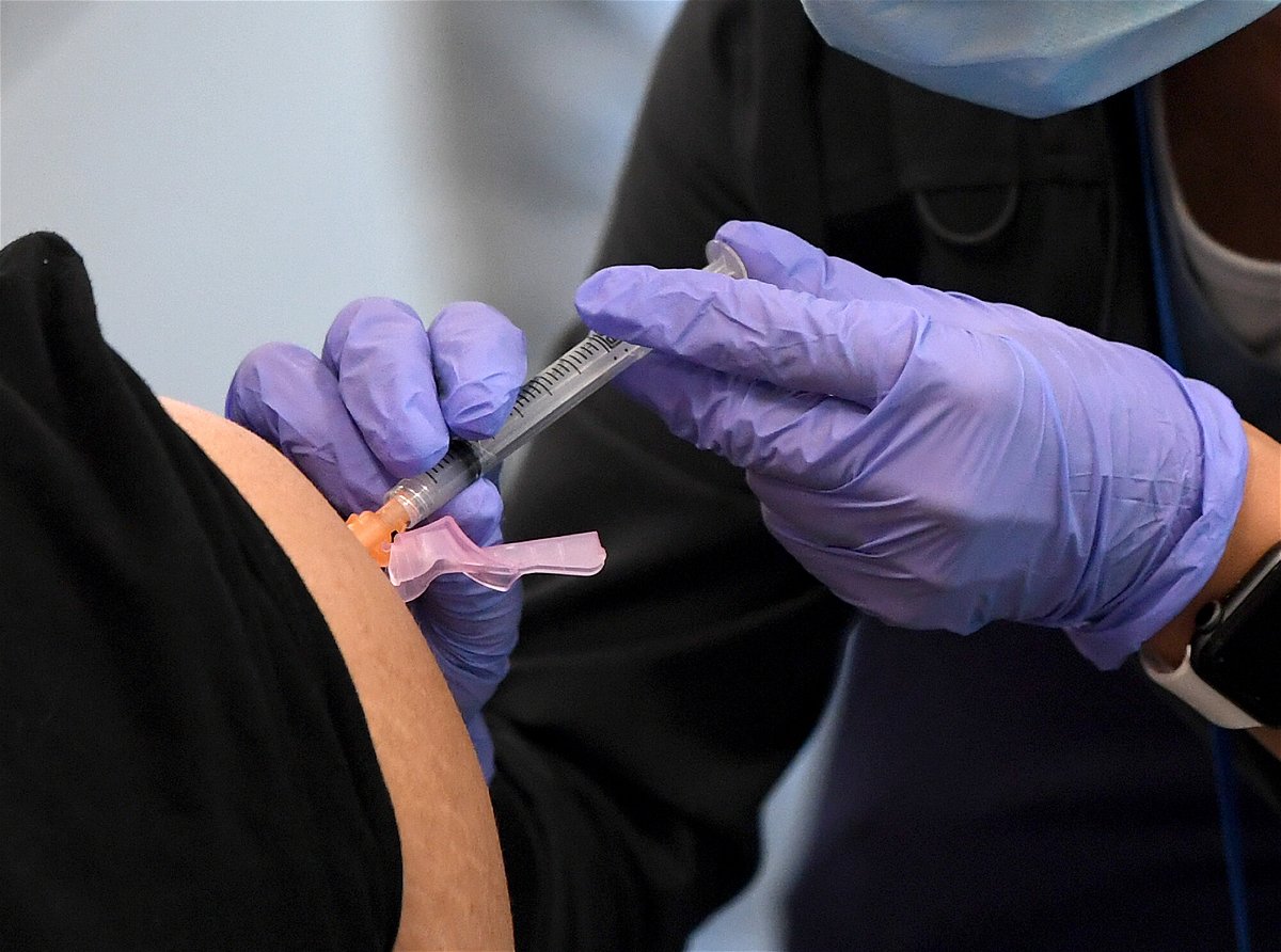 <i>Ethan Miller/Getty Images</i><br/>After months of encouraging employees to get vaccinated against Covid-19