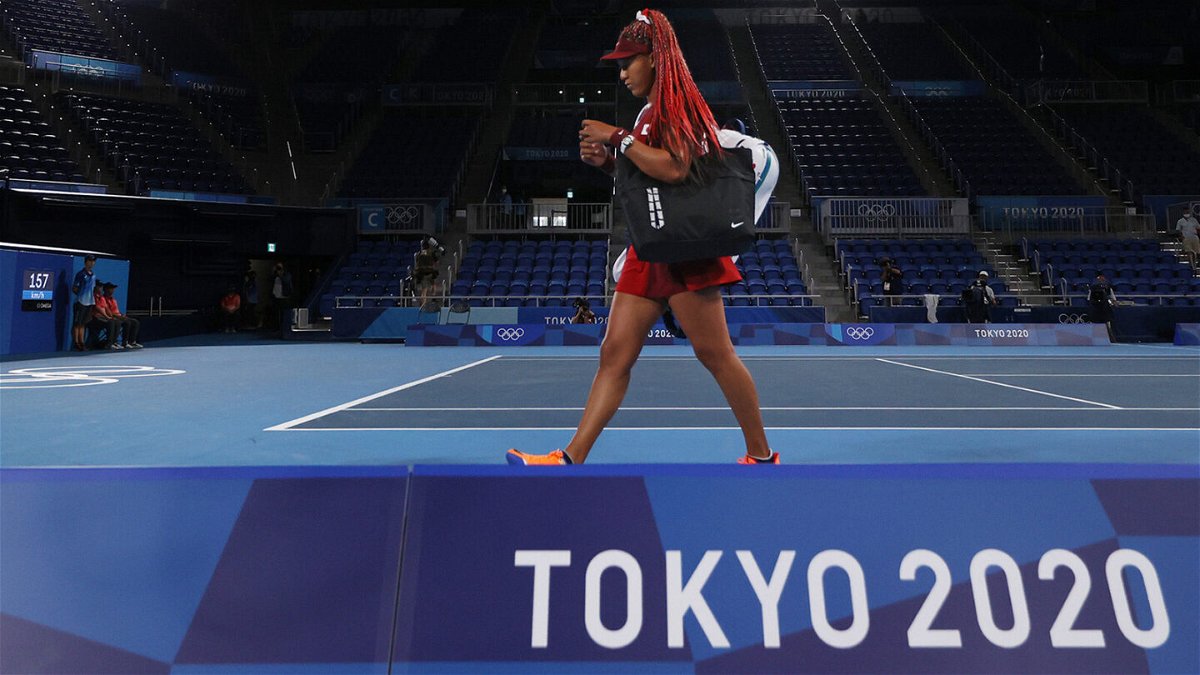 <i>David Ramos/Getty Images</i><br/>Naomi Osaka leaves the court after defeat in her third-round match against Marketa Vondrousova on day four of the Tokyo 2020 Olympic Games at  Ariake Tennis Park on July 27 in Tokyo.