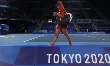 Naomi Osaka leaves the court after defeat in her third-round match against Marketa Vondrousova on day four of the Tokyo 2020 Olympic Games at  Ariake Tennis Park on July 27 in Tokyo.