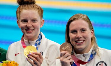 Lydia Jacoby and Lilly King accept 100m breaststroke medals