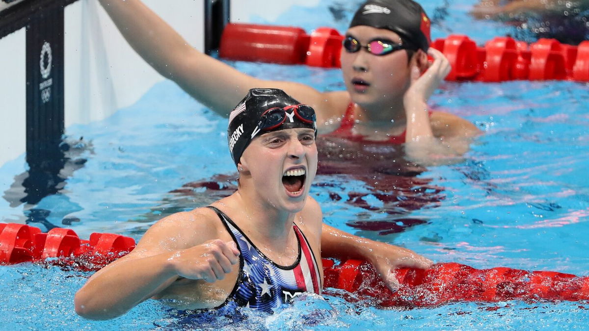 Katie Ledecky celebrates anchoring the United States to a silver medal in the women's 4x200m freestyle relay