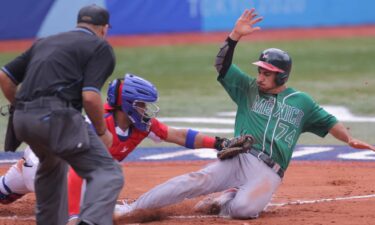 Mexican runner tagged out at home