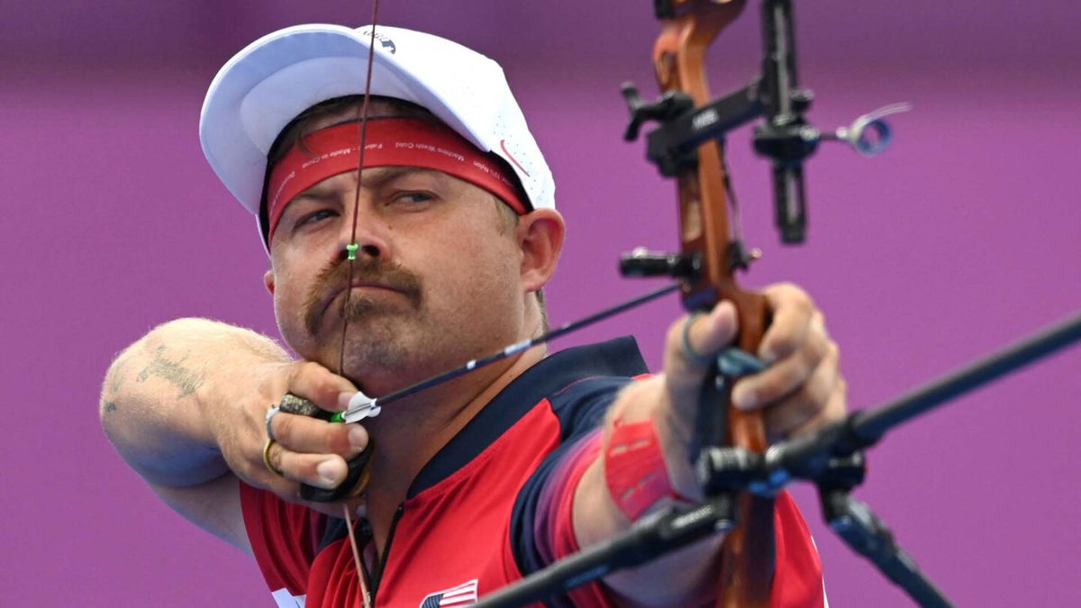 Ellison ousts teammate Wukie in men's archery Round of 16