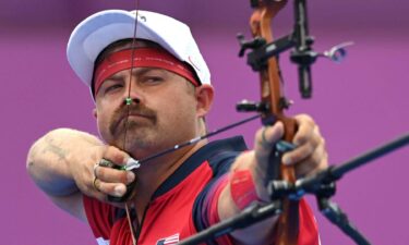 Ellison ousts teammate Wukie in men's archery Round of 16