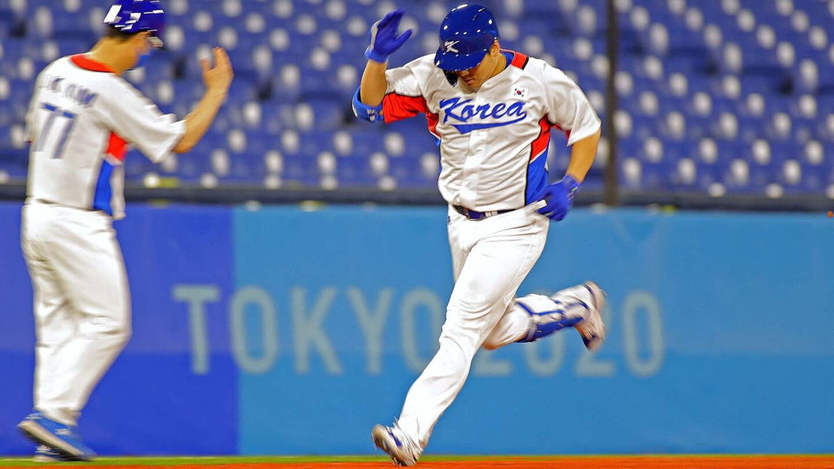 South Korean baseball player running around the field