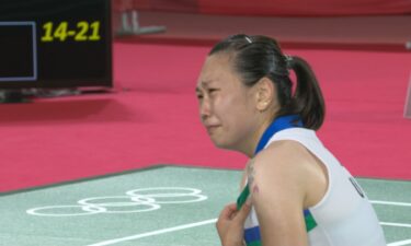 U.S.' Zhang forced to forfeit with injury