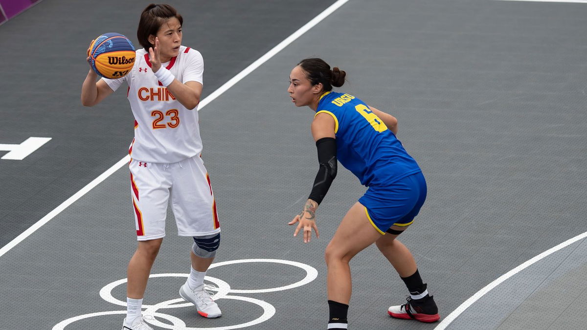 China knocks off Romania with game-winning shot