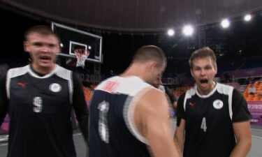 The Russian Olympic Committee basketball 3x3 team celebrates after a win